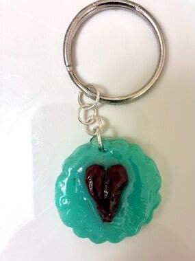 Green keychain with 3D heart